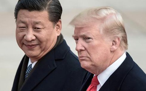 Chủ tịch Trung Quốc Tập Cận Bình (trái) và Tổng thống Mỹ Donald Trump. (Ảnh: AFP)