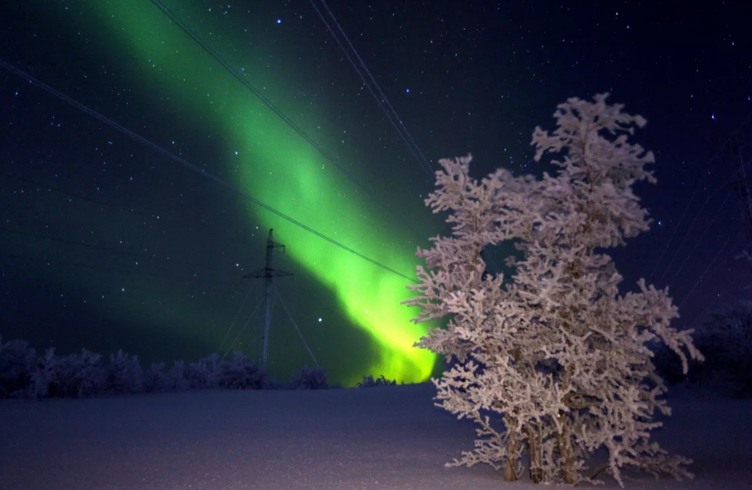 Cực quang được chụp tại Murmansk, Nga. Ảnh: sputnikglobe.com
