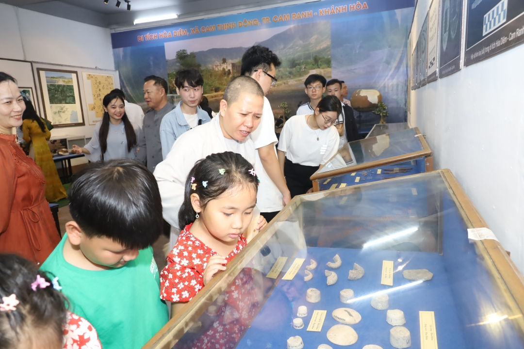 People viewing the exhibits at Khanh Hoa Museum 

