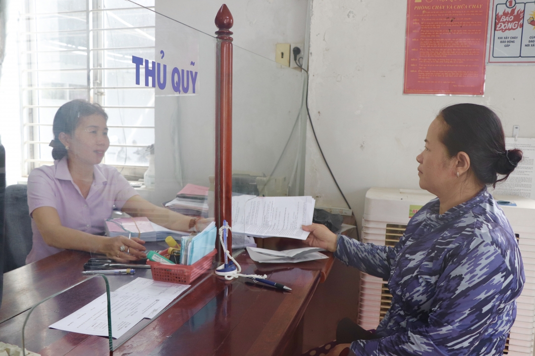 People make transactions at Vinh Phuong Peoples Credit Fund.