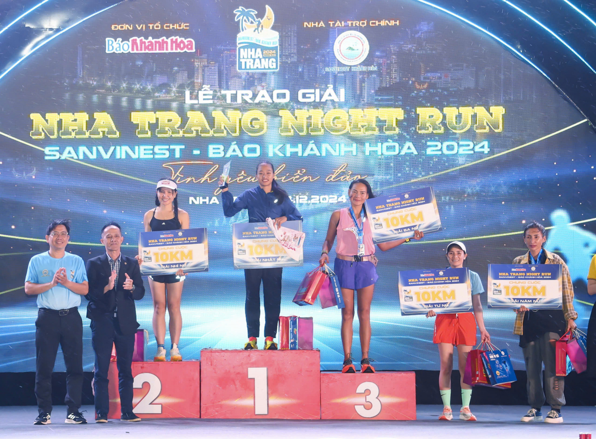 Karina Popova (furthest to the right) receiving top 5 prize

