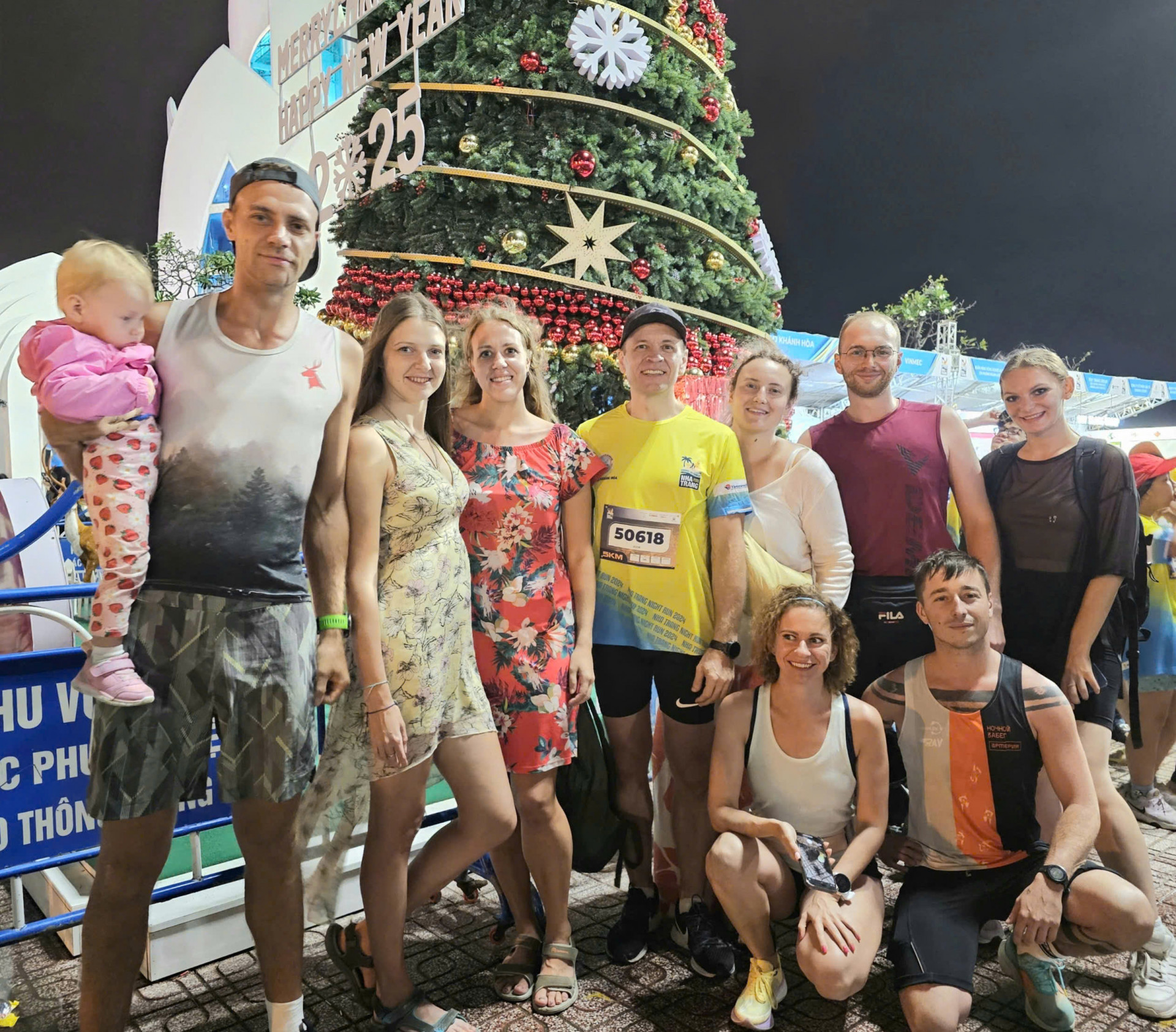 Igor posing for photo with his family and friends before the run

