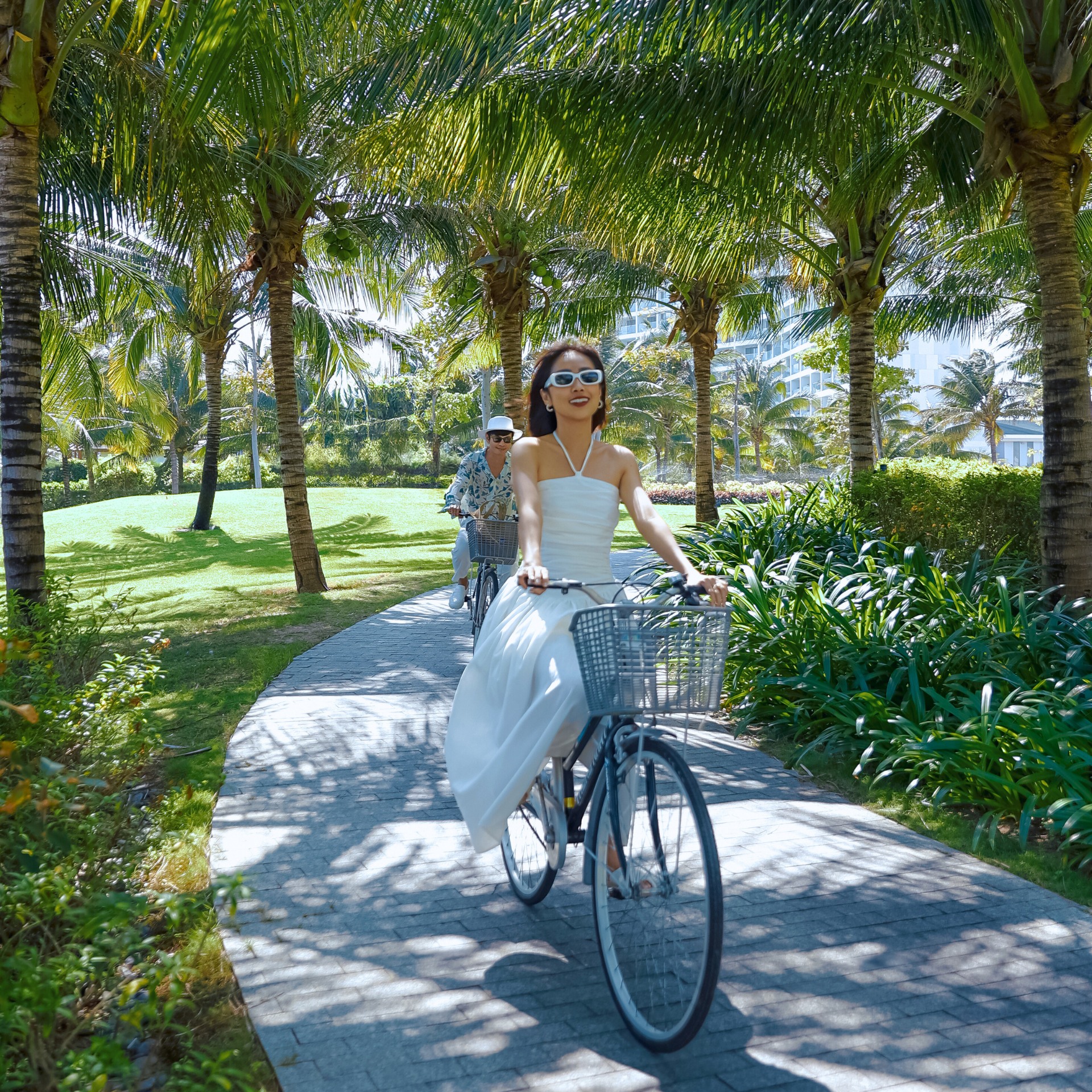 Tourists cycle to explore the Radisson Blu Cam Ranh Resort.