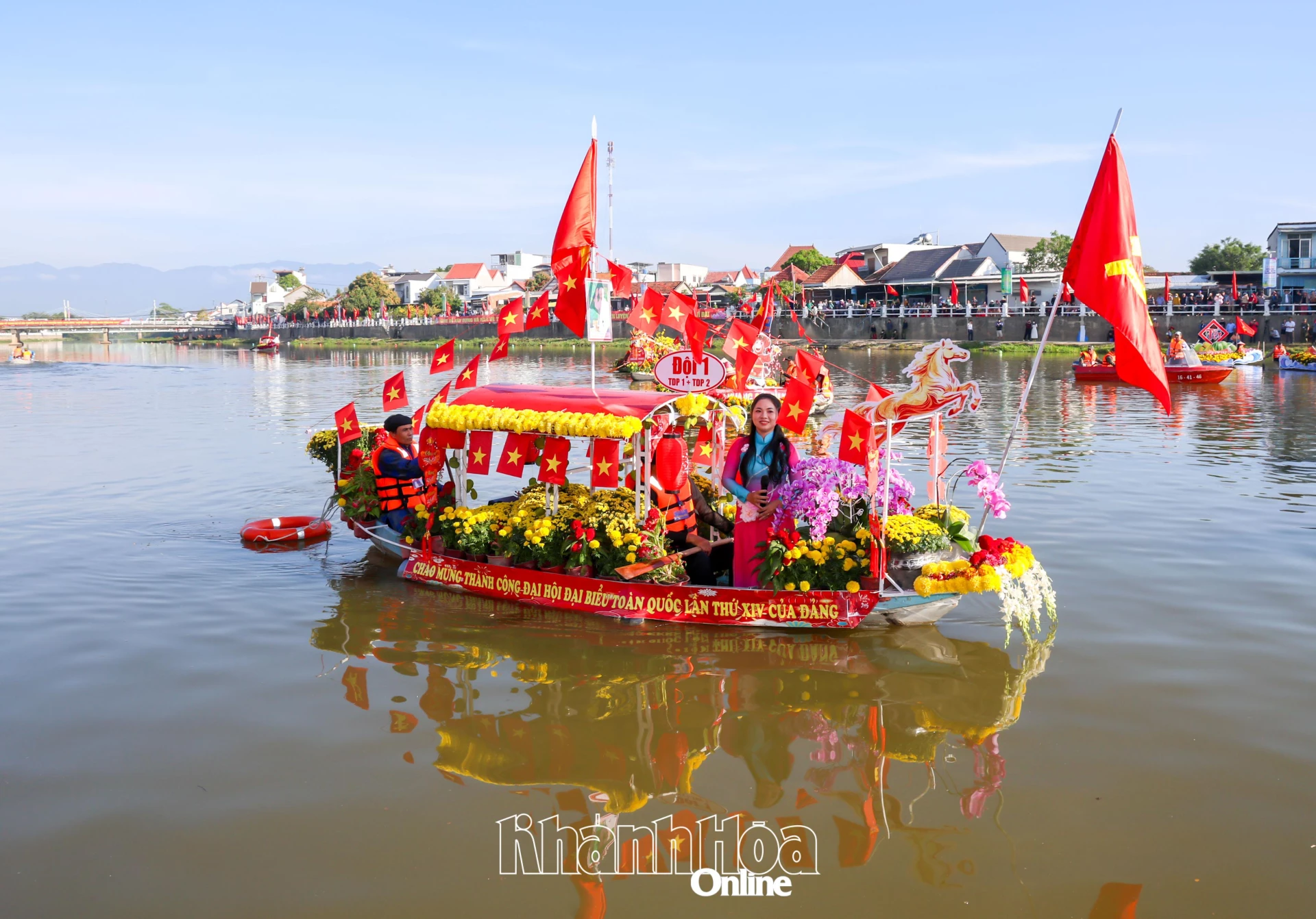 Exciting flower boat festival and boat race on Dinh River