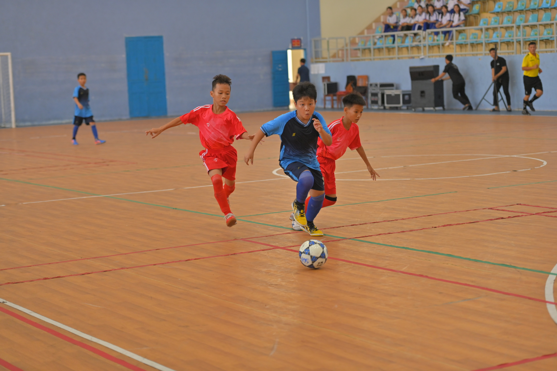 Primary pupils playing football in the festival

