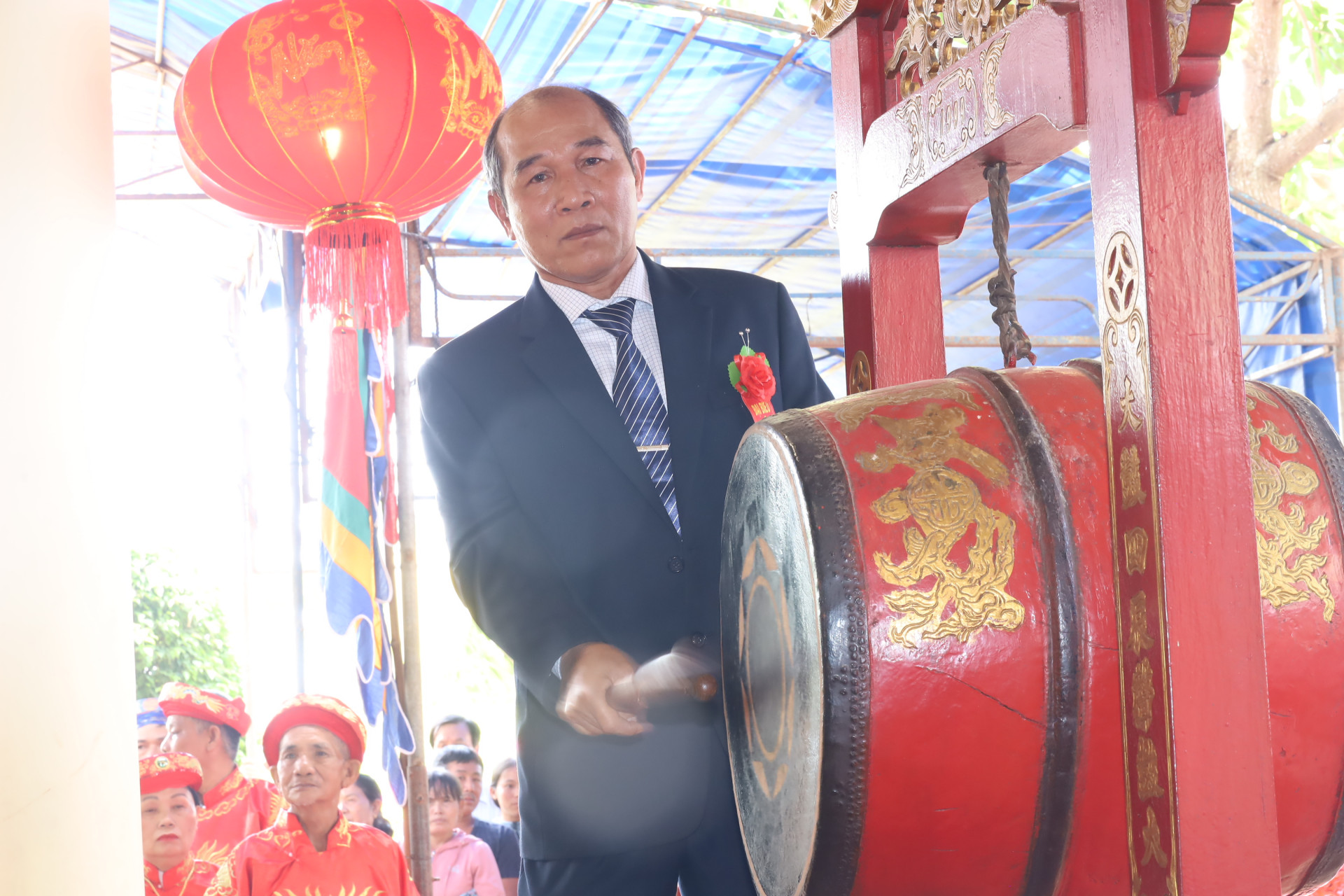 Nguyen Van Gam - Chairman of Dien Khanh District Peoples Committee beating drum to open Am Chua Festival 2024 

