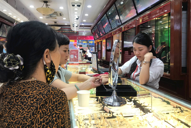 Vàng và USD cùng tăng giá mạnh