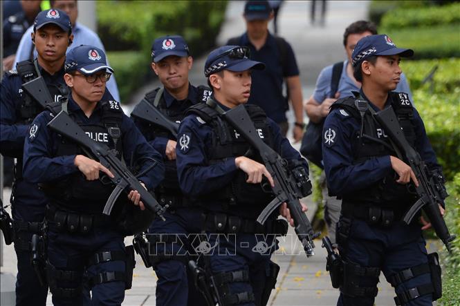 Cảnh sát tăng cường an ninh tại nhiều khu vực ở Singapore. Ảnh tư liệu: AFP/TTXVN

