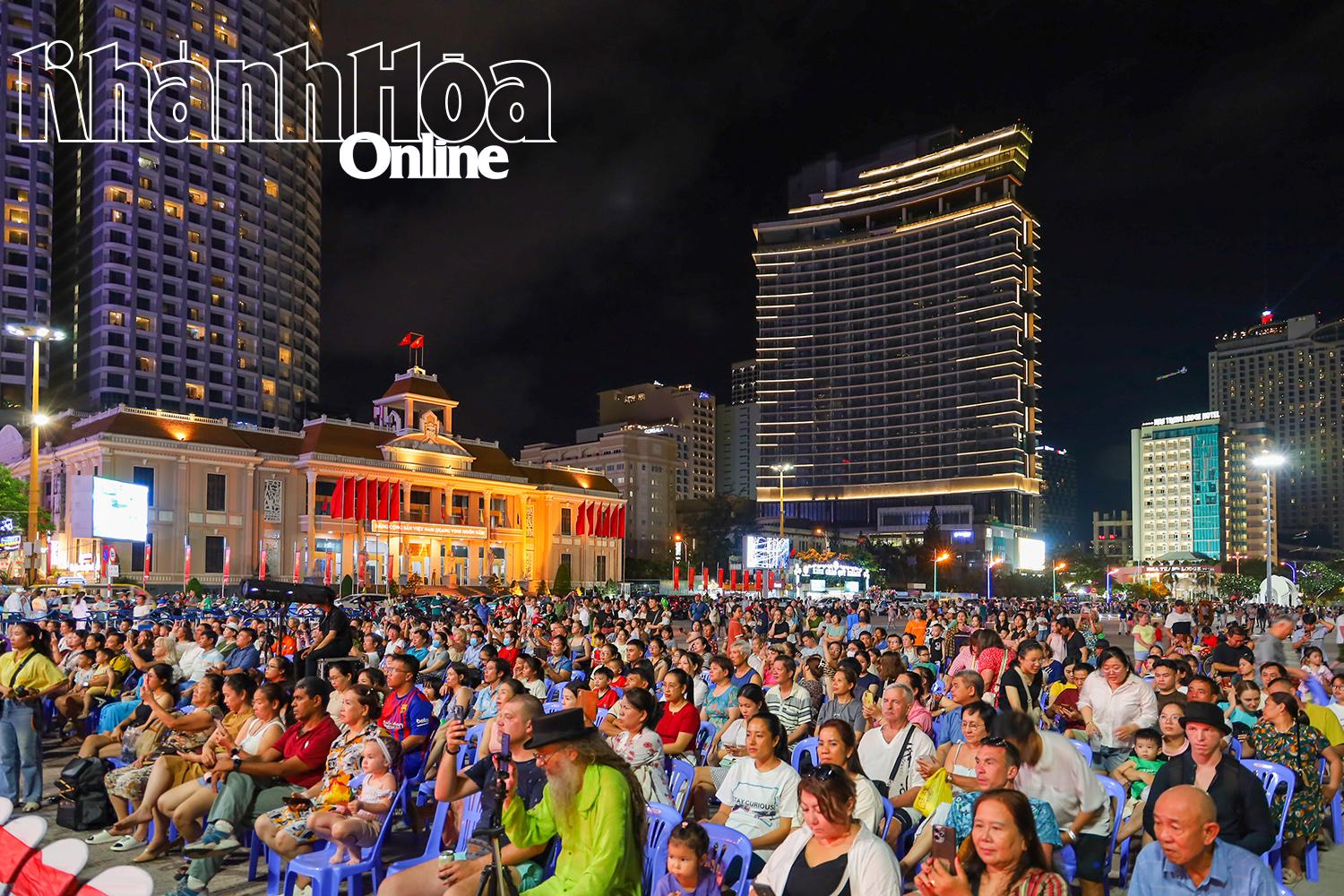 Local people and tourists see the music program

