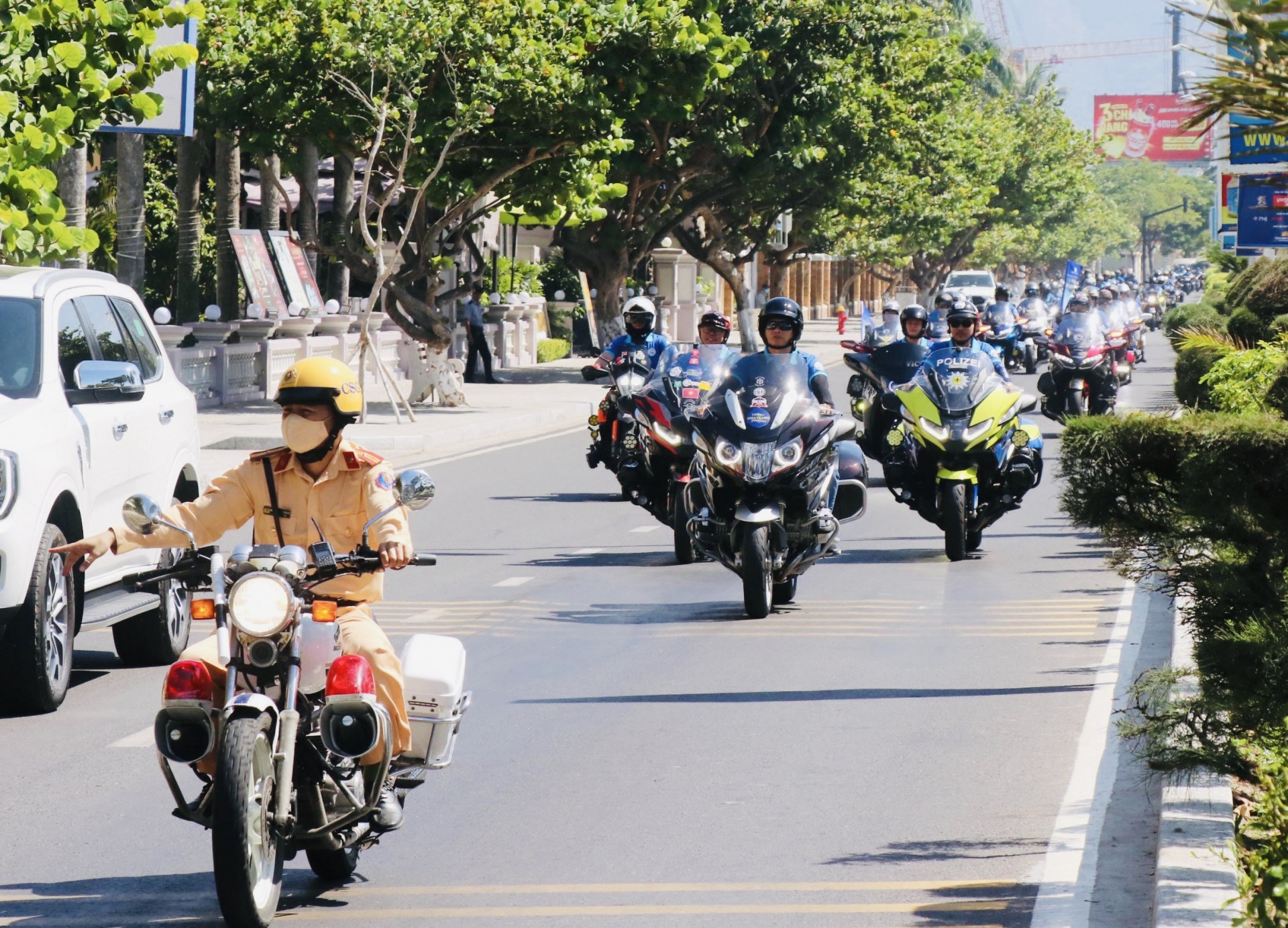 The parade escorted by traffic police

