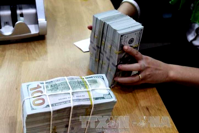 Fed giữ nguyên lãi suất, đồng USD giảm nhẹ