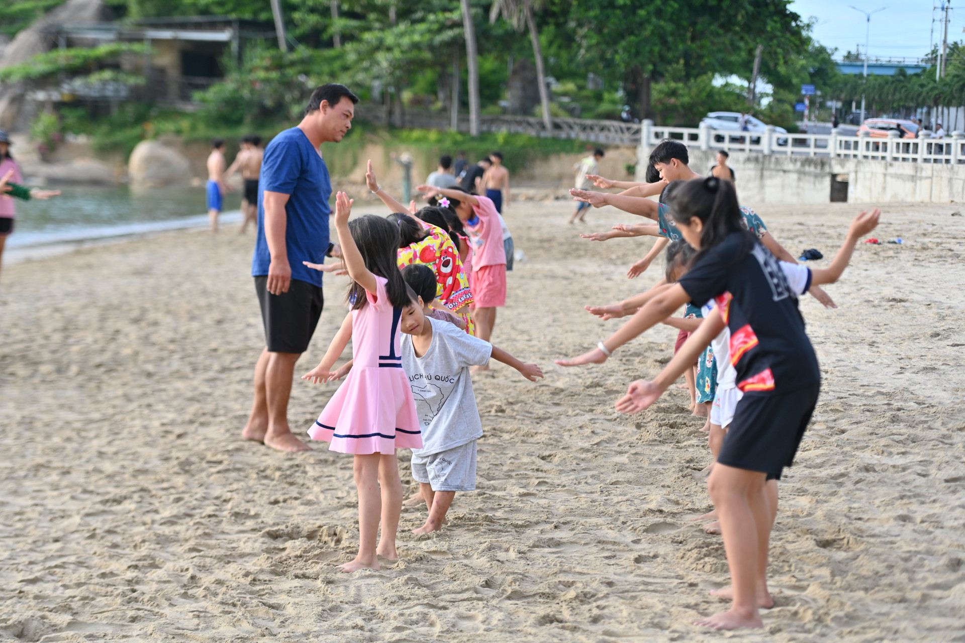 Children warming up before swimming lessons

