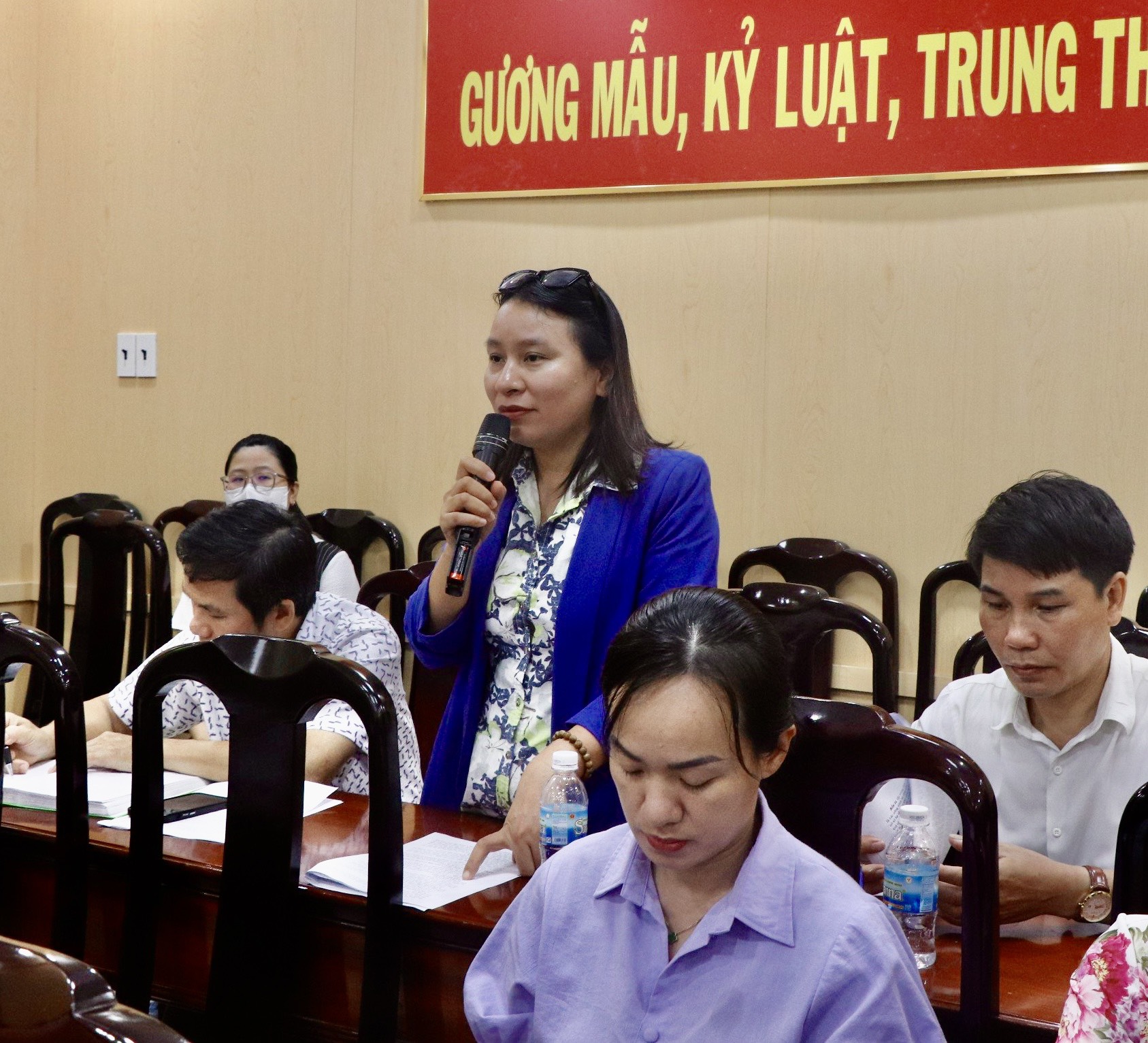 A journalist putting questions at the press conference

