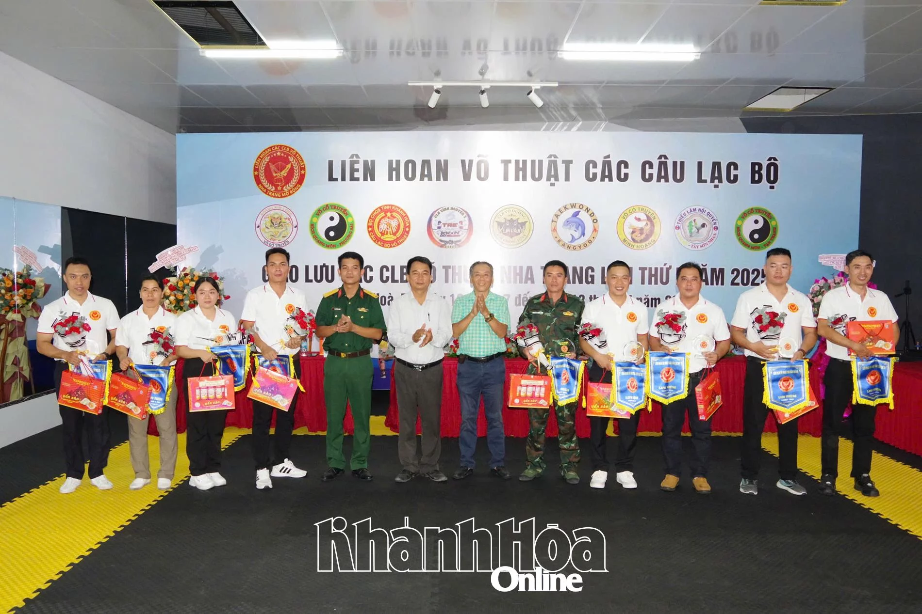 Organizing board giving commemorative flags to participating clubs

