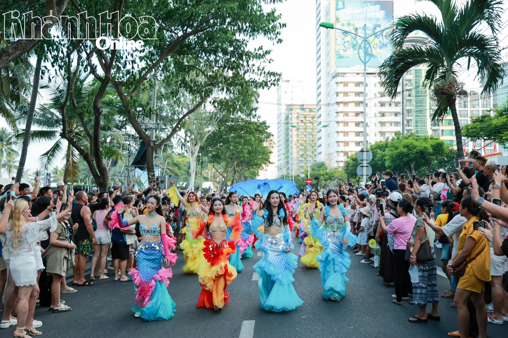 Vibrant street parade with beauty queens 