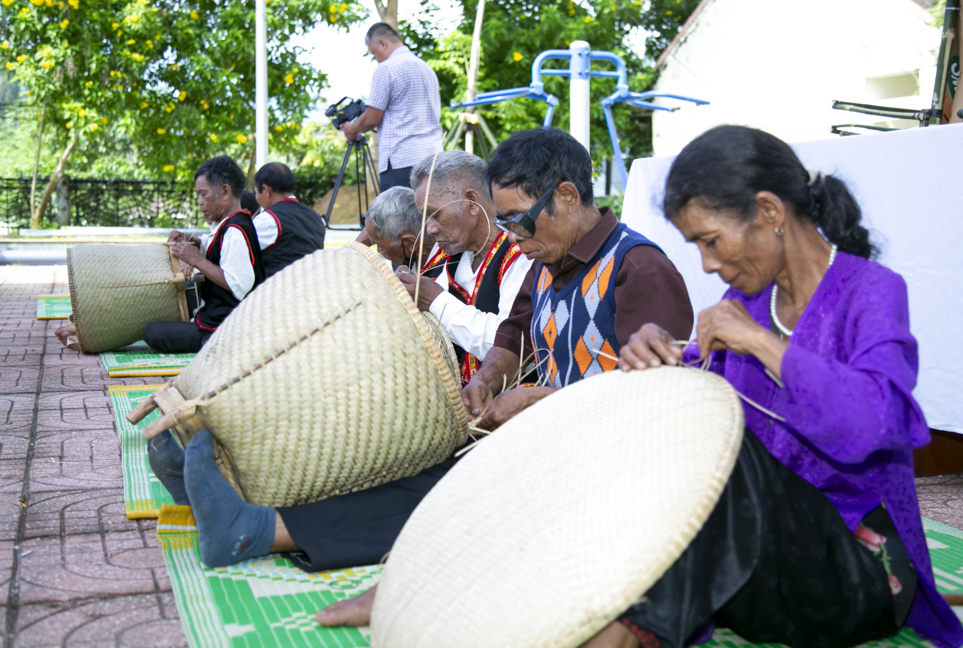 Village elders taking part in the handicraft contest 

