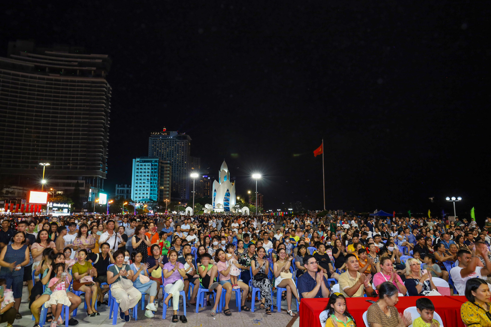 Thousands of people gather at 2-4 Square to see the music program,…

