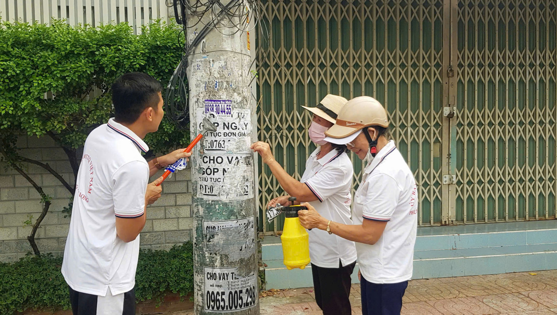 Tẩy xóa quảng cáo, rao vặt tại đường 