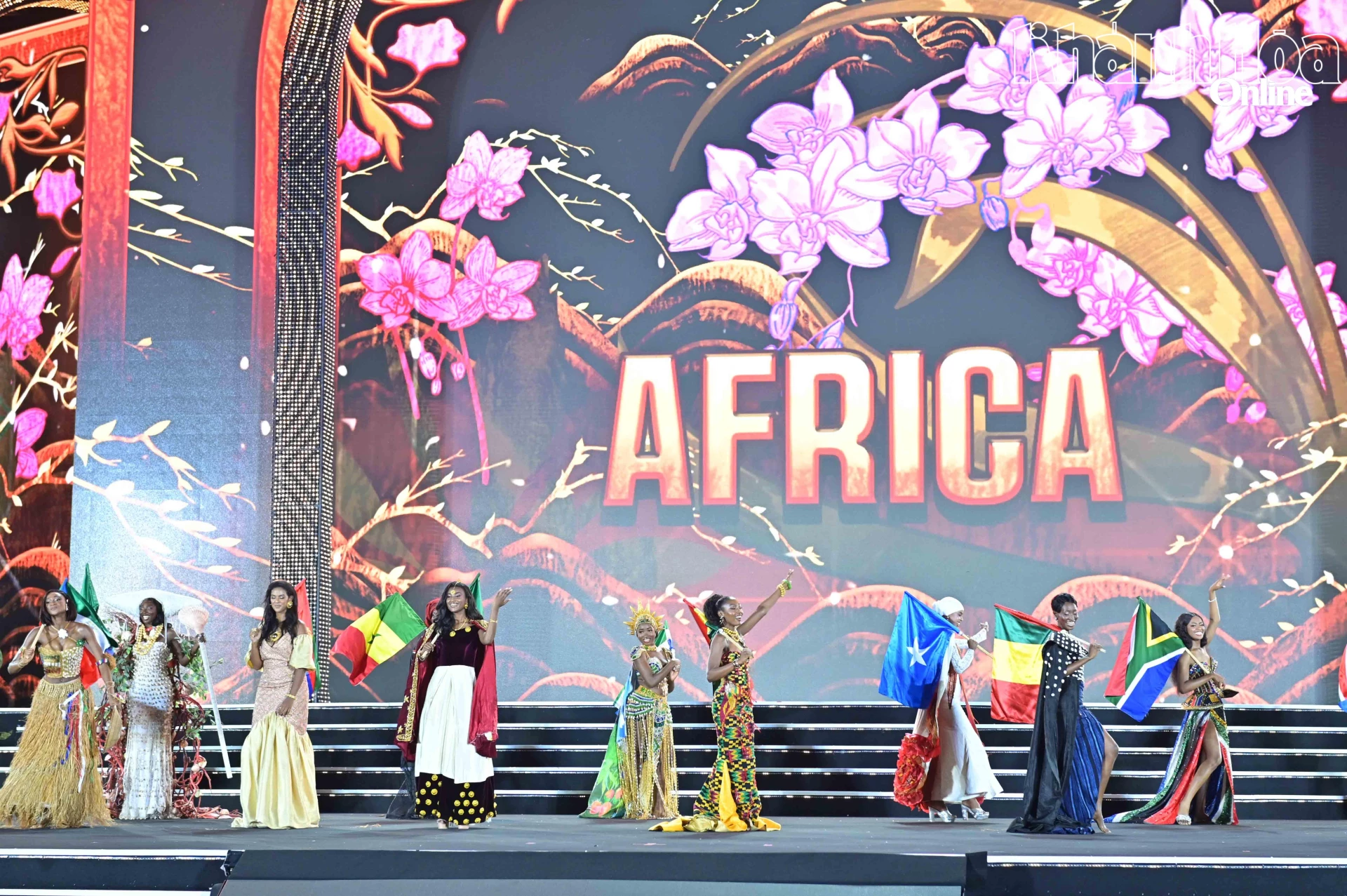 African contestants in traditional costumes

