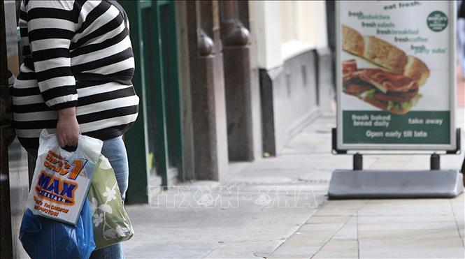 Béo phì là một trong những nguyên nhân dẫn đến tăng huyết áp ở trẻ em. Ảnh tư liệu: AFP/TTXVN