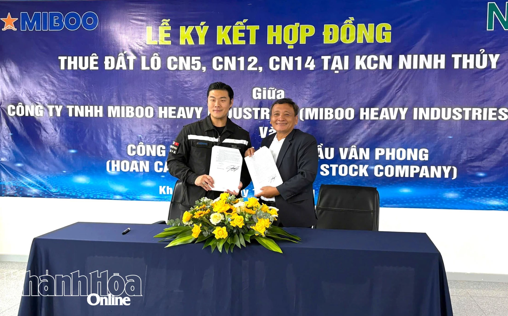 The two businesses sign the contract

