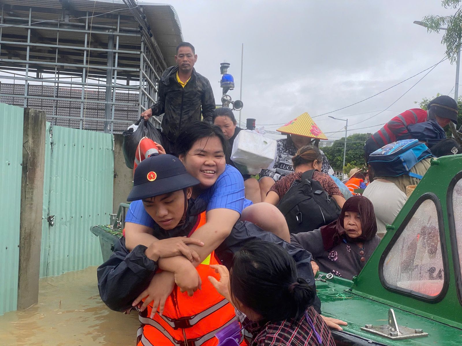 Army forces help with the flood relief.