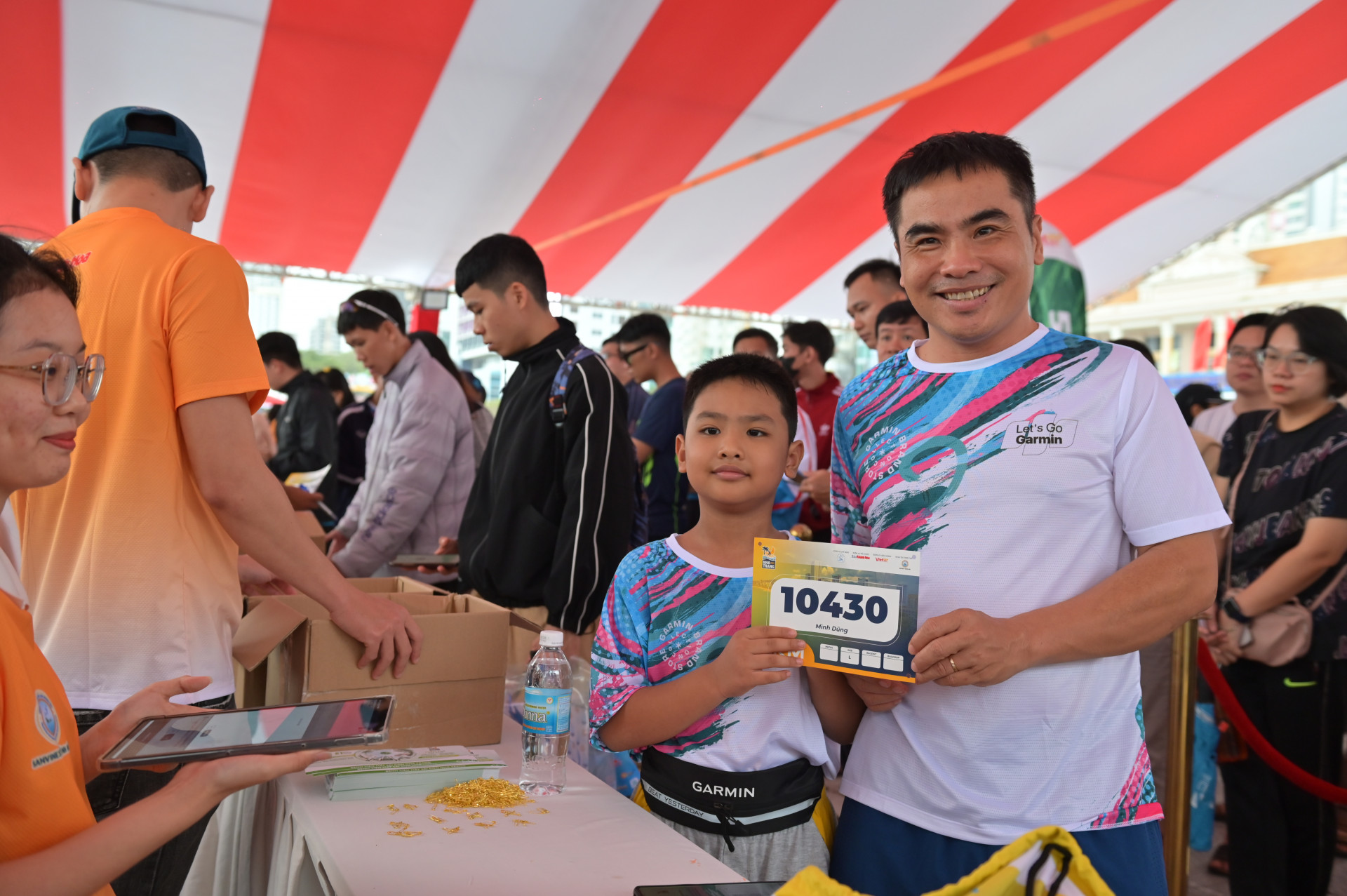 Father and son getting running kit

