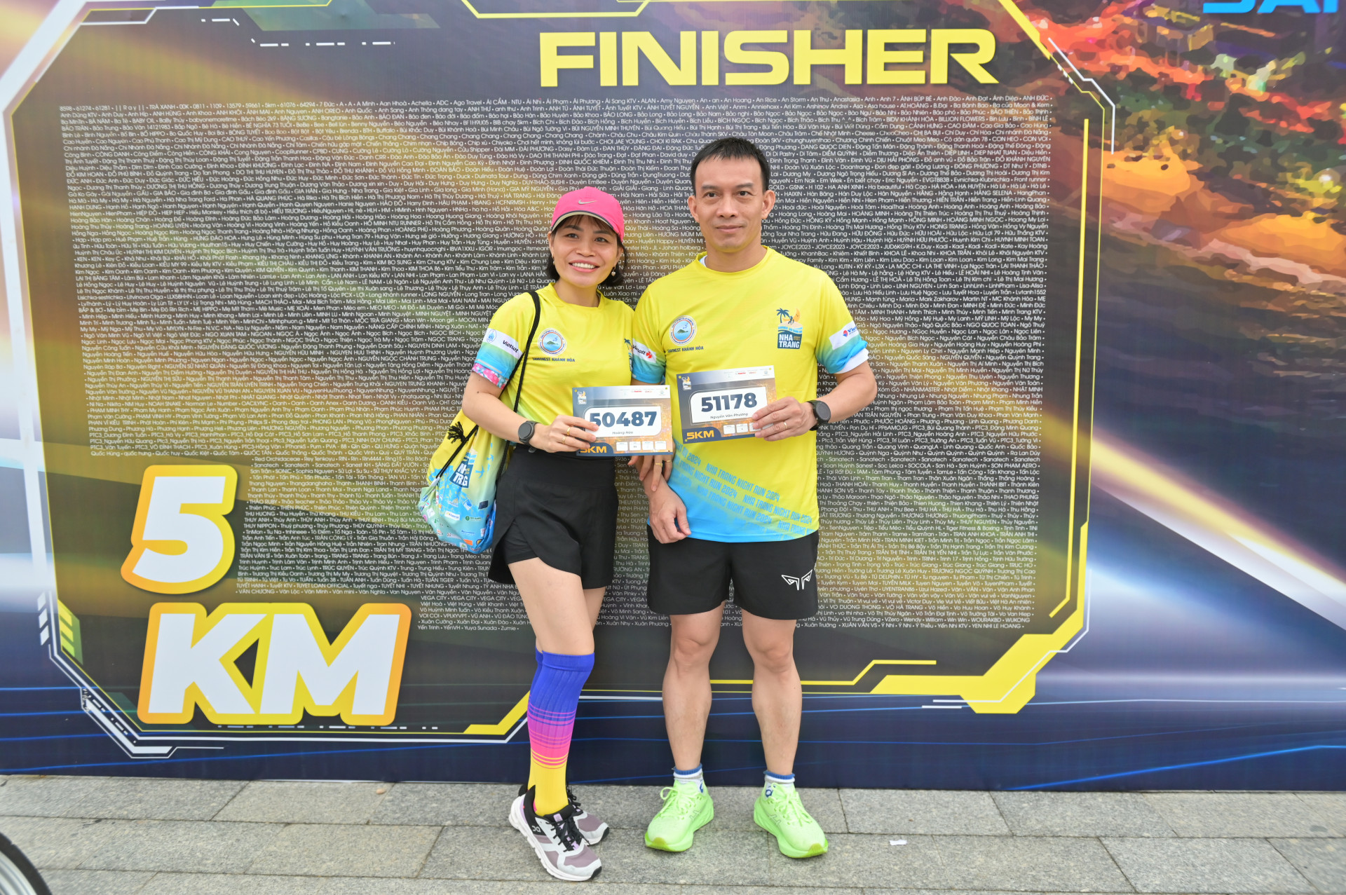 Runners posing for photos after taking running kit

