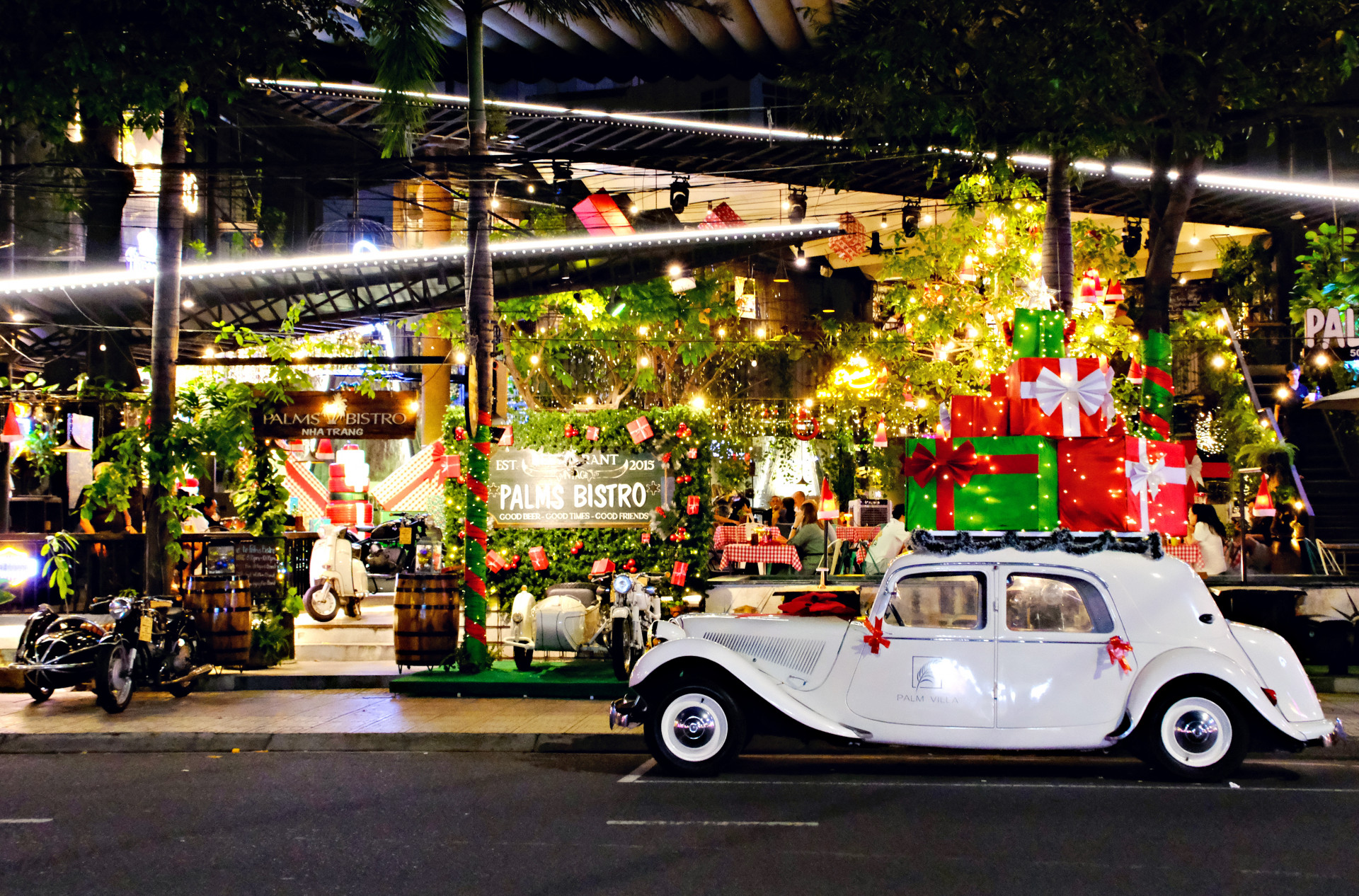 A cafe on Le Thanh Ton Street is bedecked with colorful decorations

