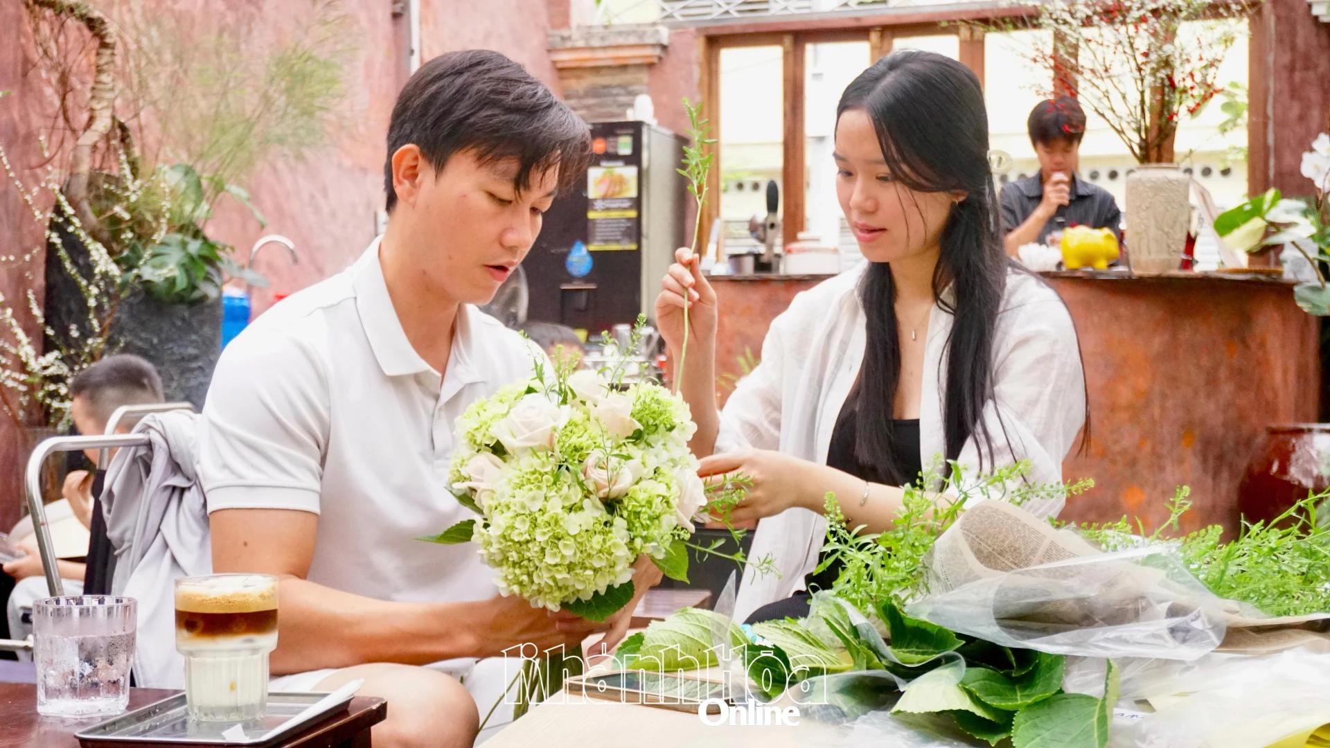 To Anh Dao and her husband spending time together at the flower buffet 

