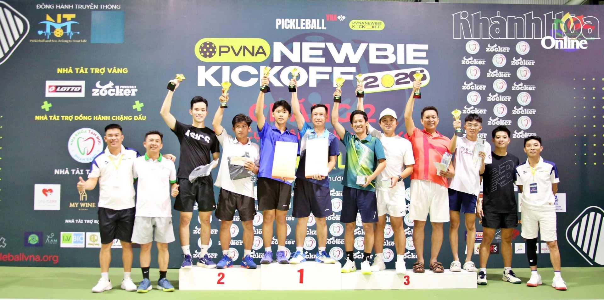 Organizers giving prizes to winners of men’s doubles