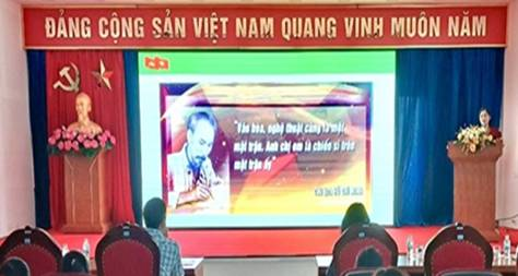 A group of people sitting in chairs in front of a large screen

AI-generated content may be incorrect.