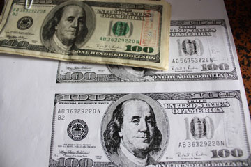 Triệt phá đường dây tàng trữ, tiêu thụ USD giả quy mô lớn