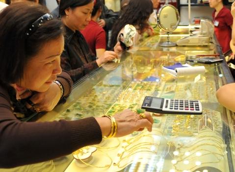 Giá vàng và USD lại biến động