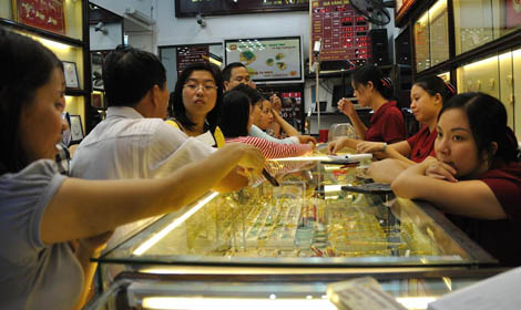 Vàng tiếp tục mất mốc 42 triệu đồng