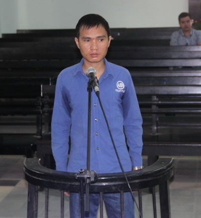 Lê Vũ Huy trong ngày ra Tòa