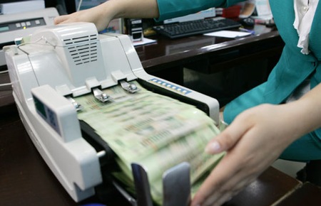 Fitch: Ngân hàng Việt Nam “ổn định” trong năm 2014