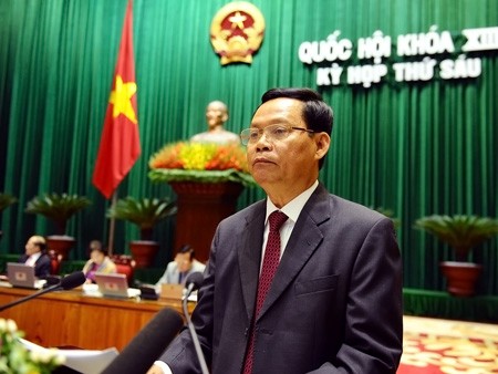 Tổng Thanh tra Chính phủ Huỳnh Phong Tranh trình bày báo cáo trước Quốc hội. Ảnh VGP/Nhật Bắc