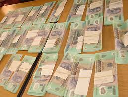 Nghiêm cấm hành vi trả lại tiền giả, tiền nghi giả cho khách hàng