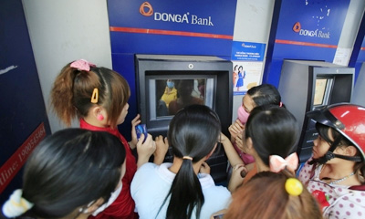 Các ngân hàng phải đáp ứng nhu cầu rút tiền tại ATM dịp giáp Tết