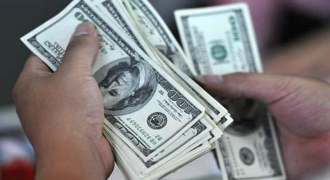 Tỷ giá hạch toán ngoại tệ tháng 1/2014 ở mức 21.036 đồng/USD