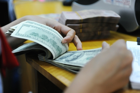 "Sóng" tỷ giá USD/VND tái xuất