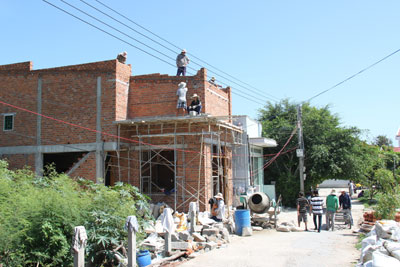 Đảo Bình Ba (xã đảo Cam Bình) với đường láng bê tông, nhà cửa xây dựng khang trang.