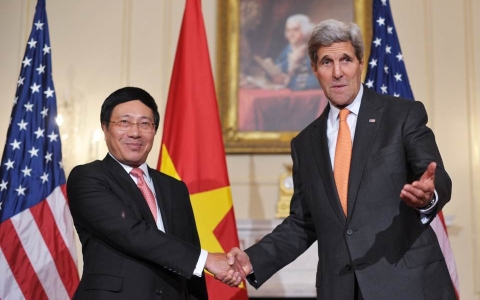 Phó Thủ tướng, Bộ trưởng Ngoại giao Phạm Bình Minh và Ngoại trưởng Mỹ John Kerry (Ảnh AFP)