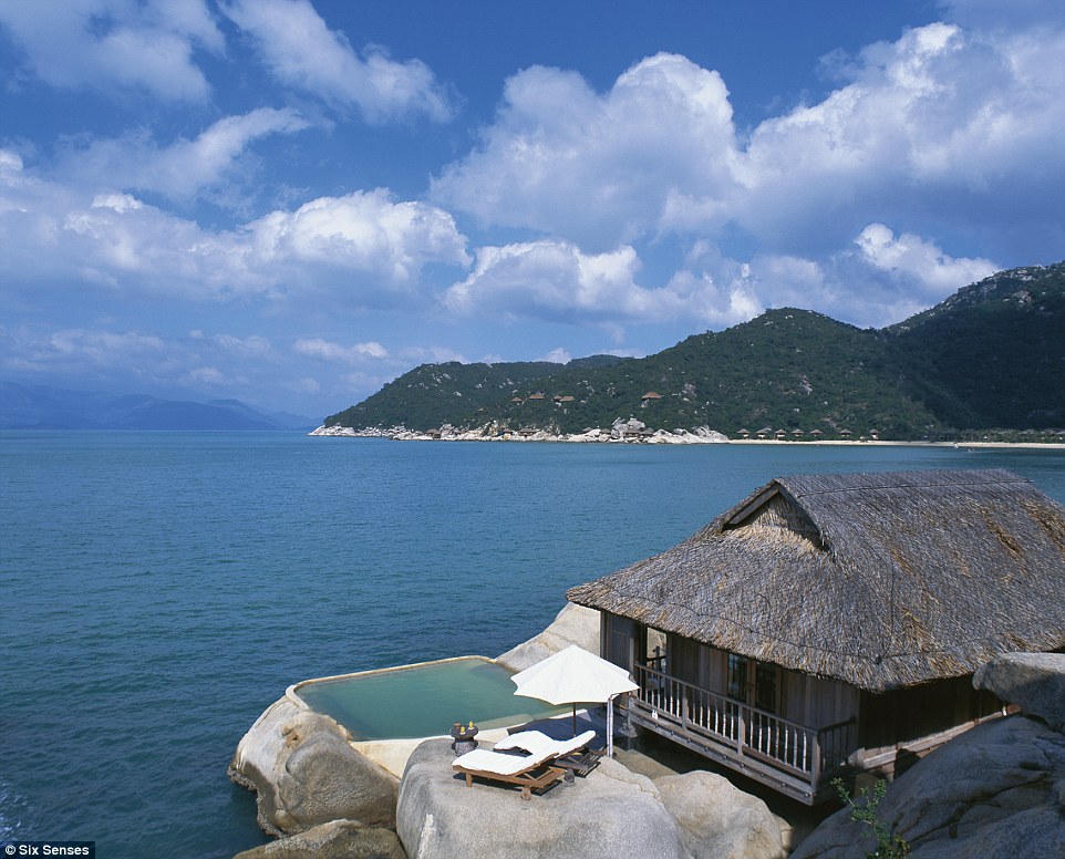Water Villa number 5 at the Six Senses hotel is perched on the edge of Ninh Van Bay in Nha Trang, Vietnam  Read more: http://www.dailymail.co.uk/travel/travel_news/article-2828779/Mr-Mrs-Smith-unveils-sexiest-hotel-room-world.html#ixzz3JwppPtB4 Follow us: @MailOnline on Twitter | DailyMail on Facebook