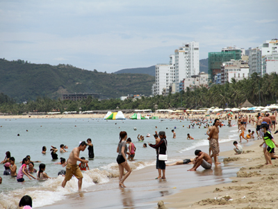 Nha Trang beach crowded with tourists in summer