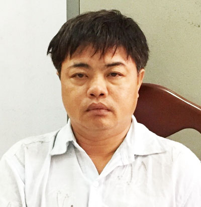 Đối tượng Lai tại cơ quan điều tra. (Ảnh do cơ quan Công an cung cấp)