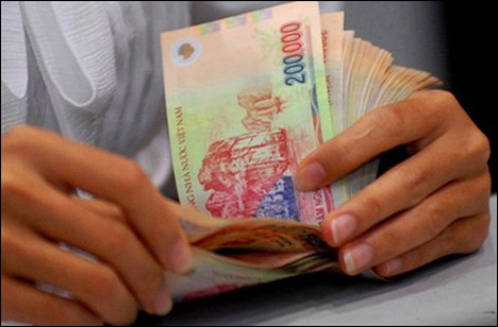 Lượng tiền giả thu giữ trong Quý III/2015 giảm 23% so với cùng kỳ năm 2014