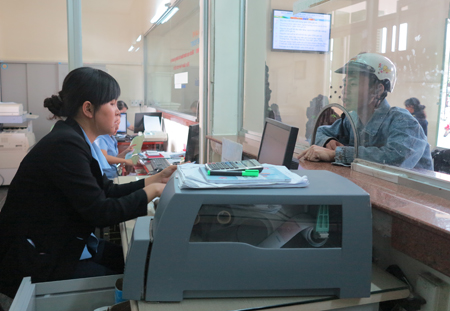 Buying train tickets at Nha Trang Railway Station