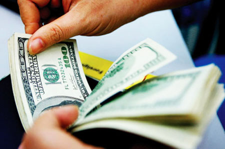 Tỷ giá trung tâm giảm từ mức đỉnh 1 tháng